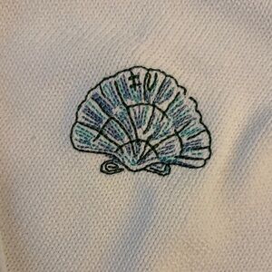 White Sweater with Embroidered Shell Design
